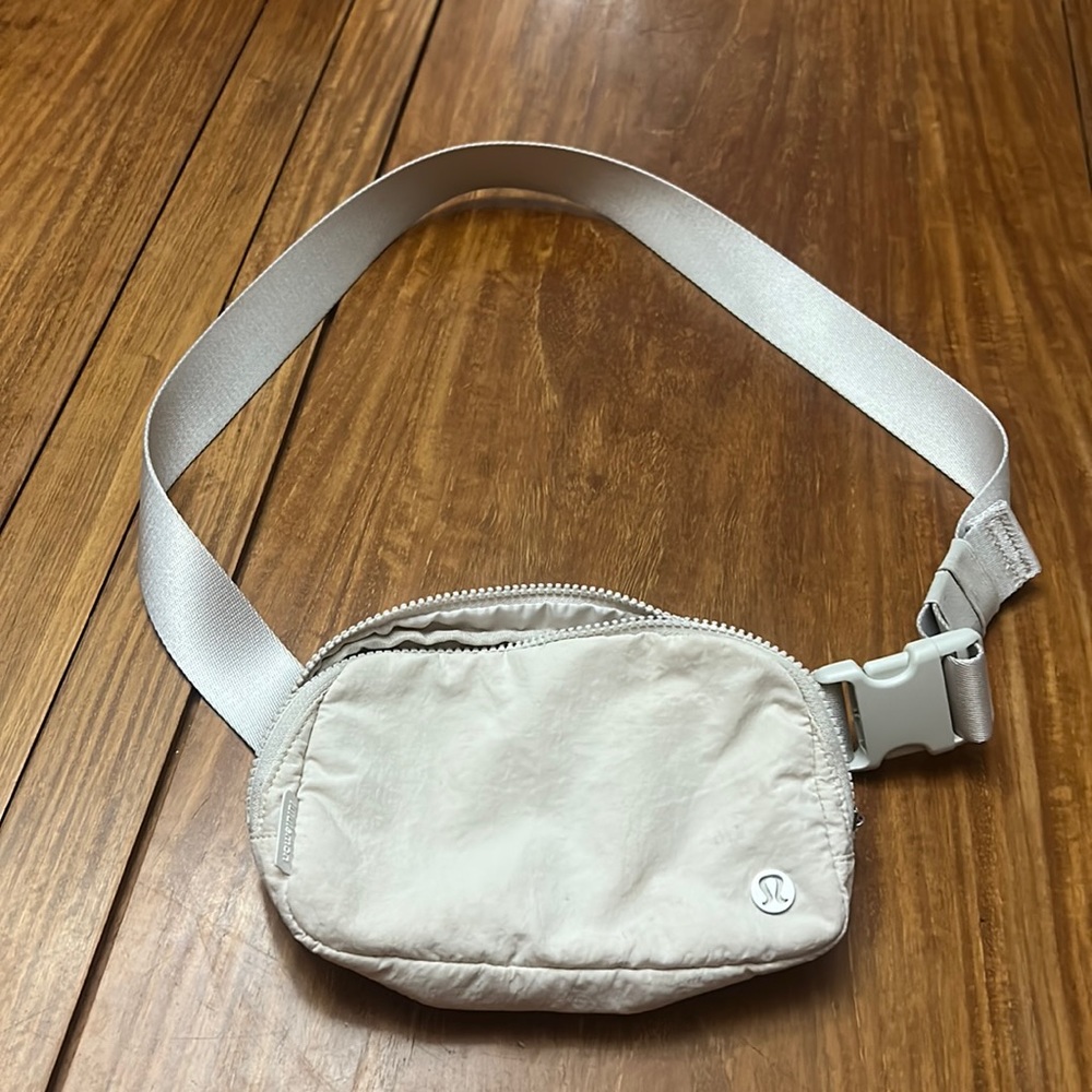 Small Lululemon across body bag. Off white in color